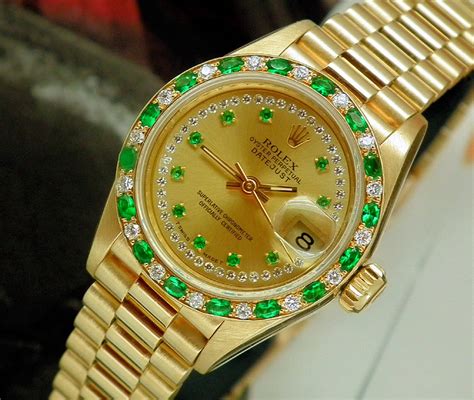 gold and emerald rolex